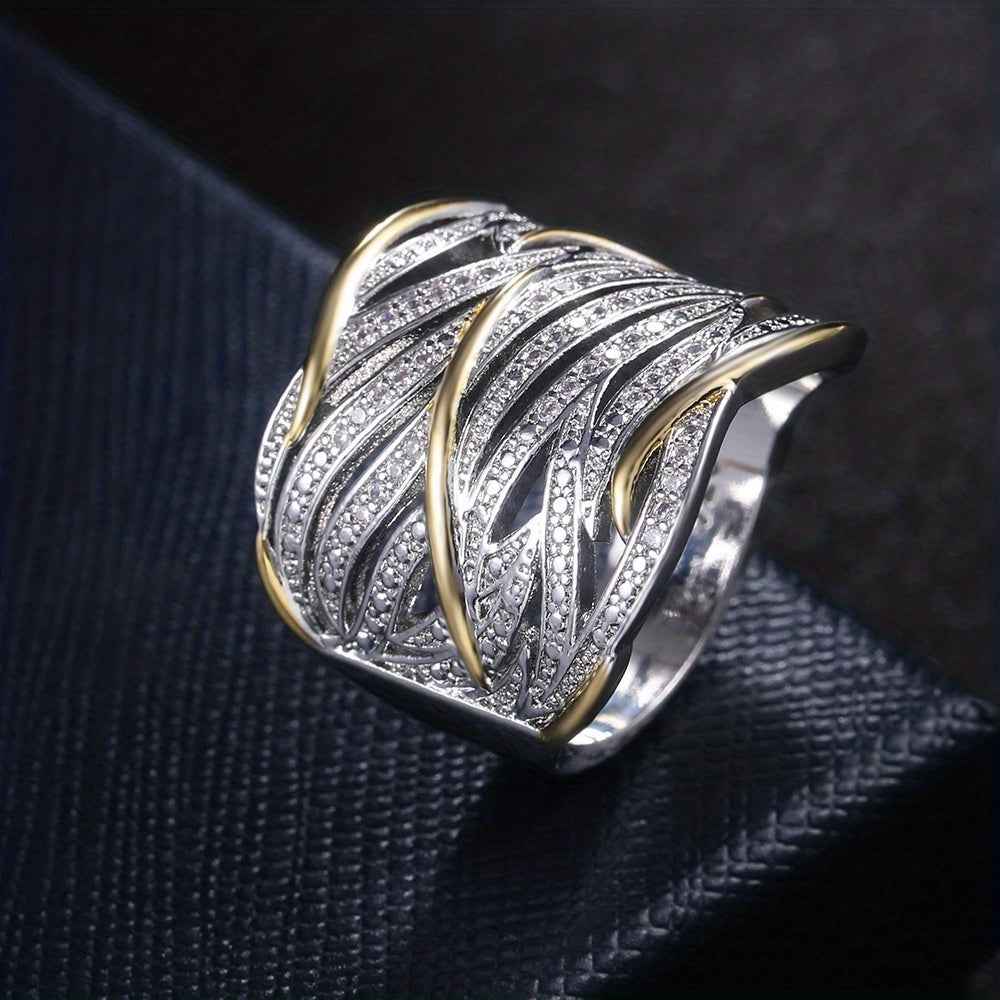 RHEA – TWISTED BAND RING