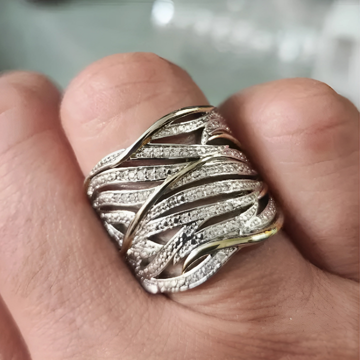 RHEA – TWISTED BAND RING